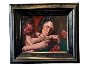Framed painting of a couple embracing with a black frame.
