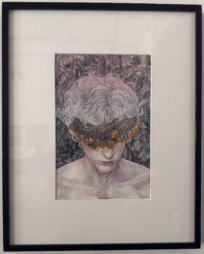 Framed artwork of a person with floral headpiece on a plain wall
