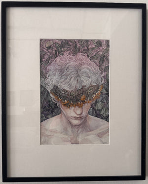 Framed artwork of a person with floral headpiece on a plain wall