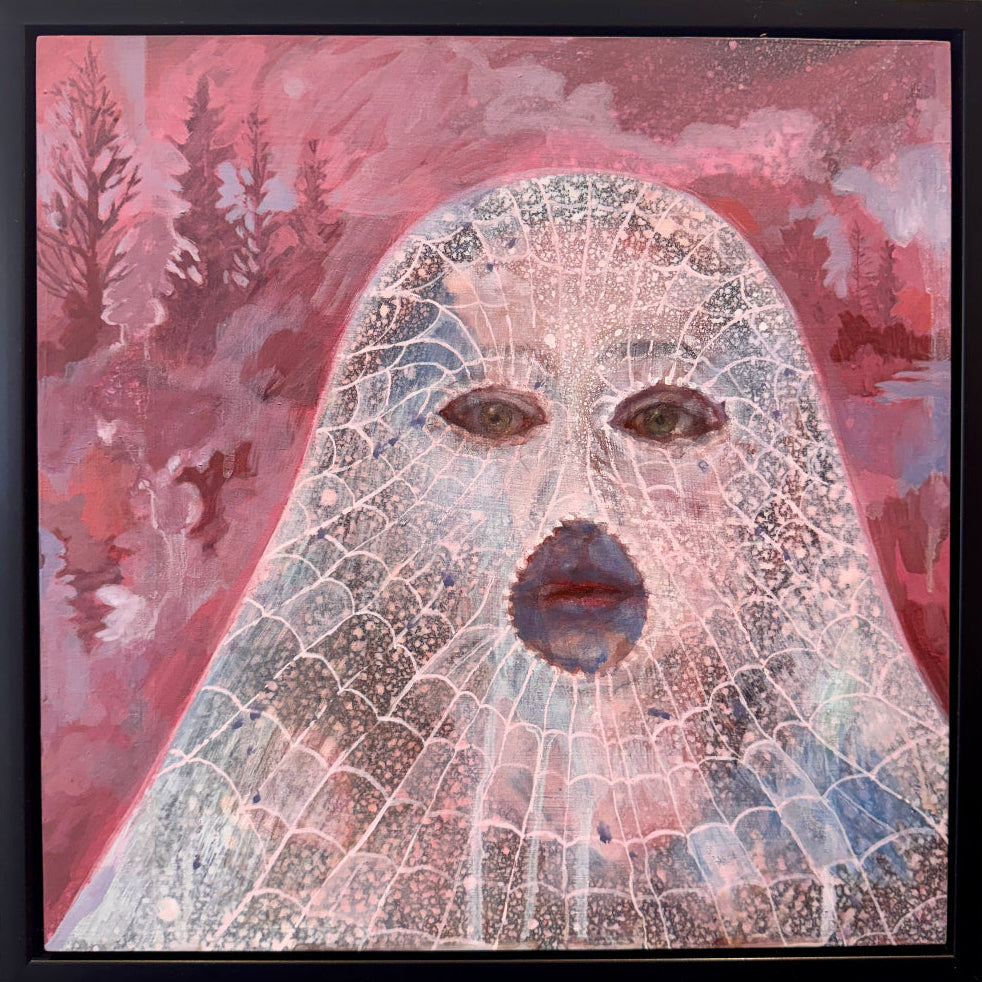Framed artwork with a face-like design on a pink and purple abstract background