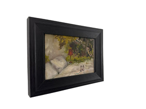 Framed painting of a garden scene with a red lamp and a cat on a white wall.