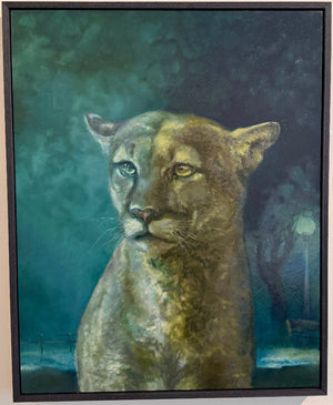 Framed painting of a lioness with a dark, textured background