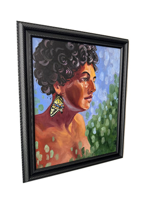 Framed artwork of a person with butterfly on neck against a nature background