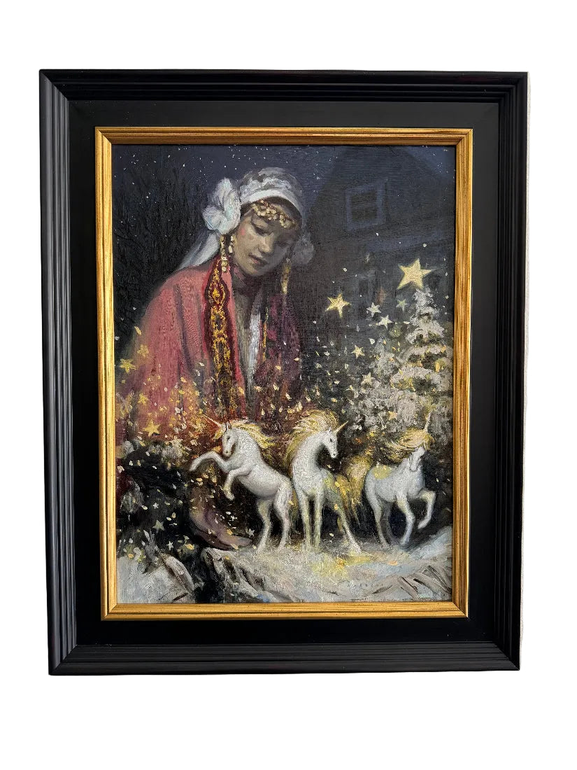 Woman in a snowy scene with unicorns and stars