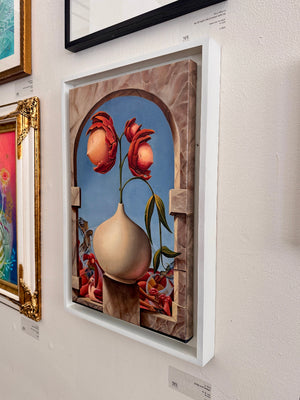 Artistic depiction of a vase with flowers in a decorative frame on a wall.