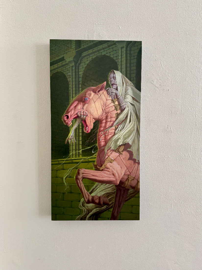 Horse-like creature with a ghostly figure on its back, set against a dark brick wall.