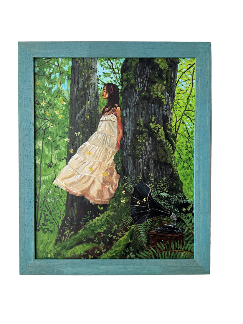 Framed artwork of a woman in a white dress standing next to a tree in a forest setting.