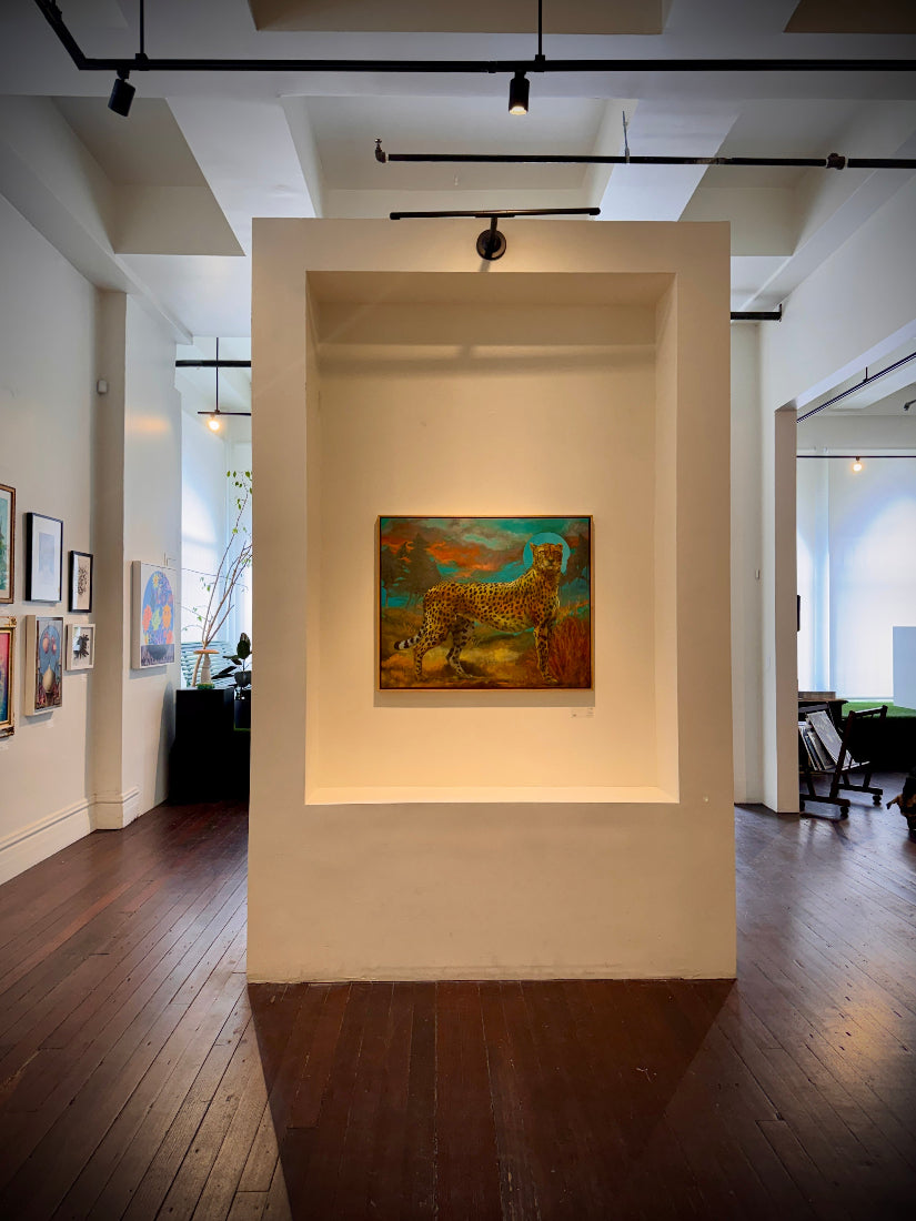 Art gallery with a painting on a wall