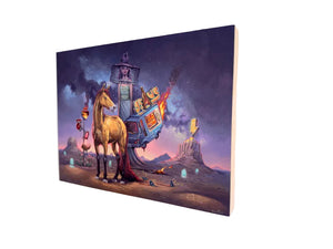 Framed artwork of a horse and a fantastical house on a wall.