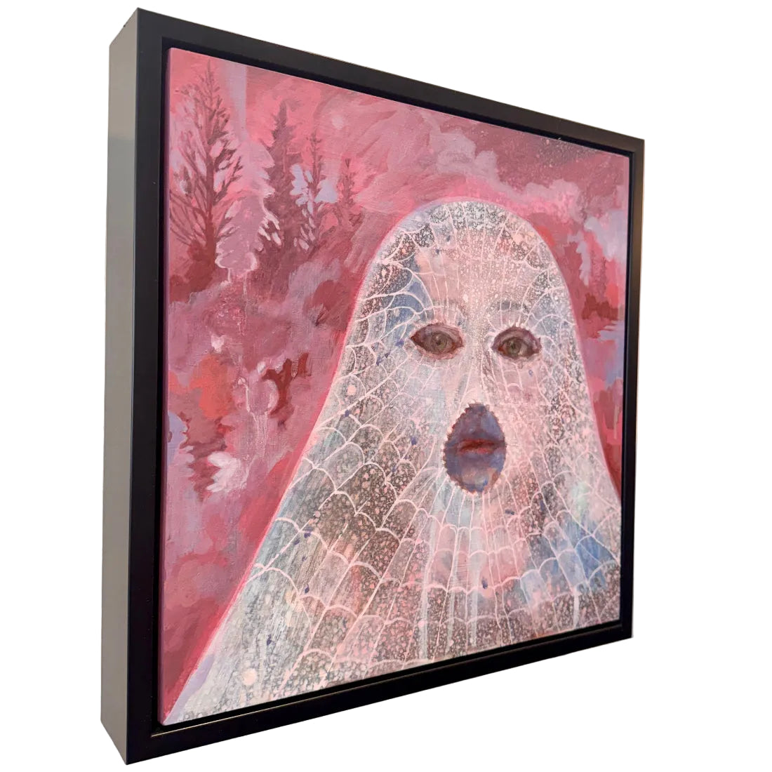 Framed artwork with a face design on a pink background
