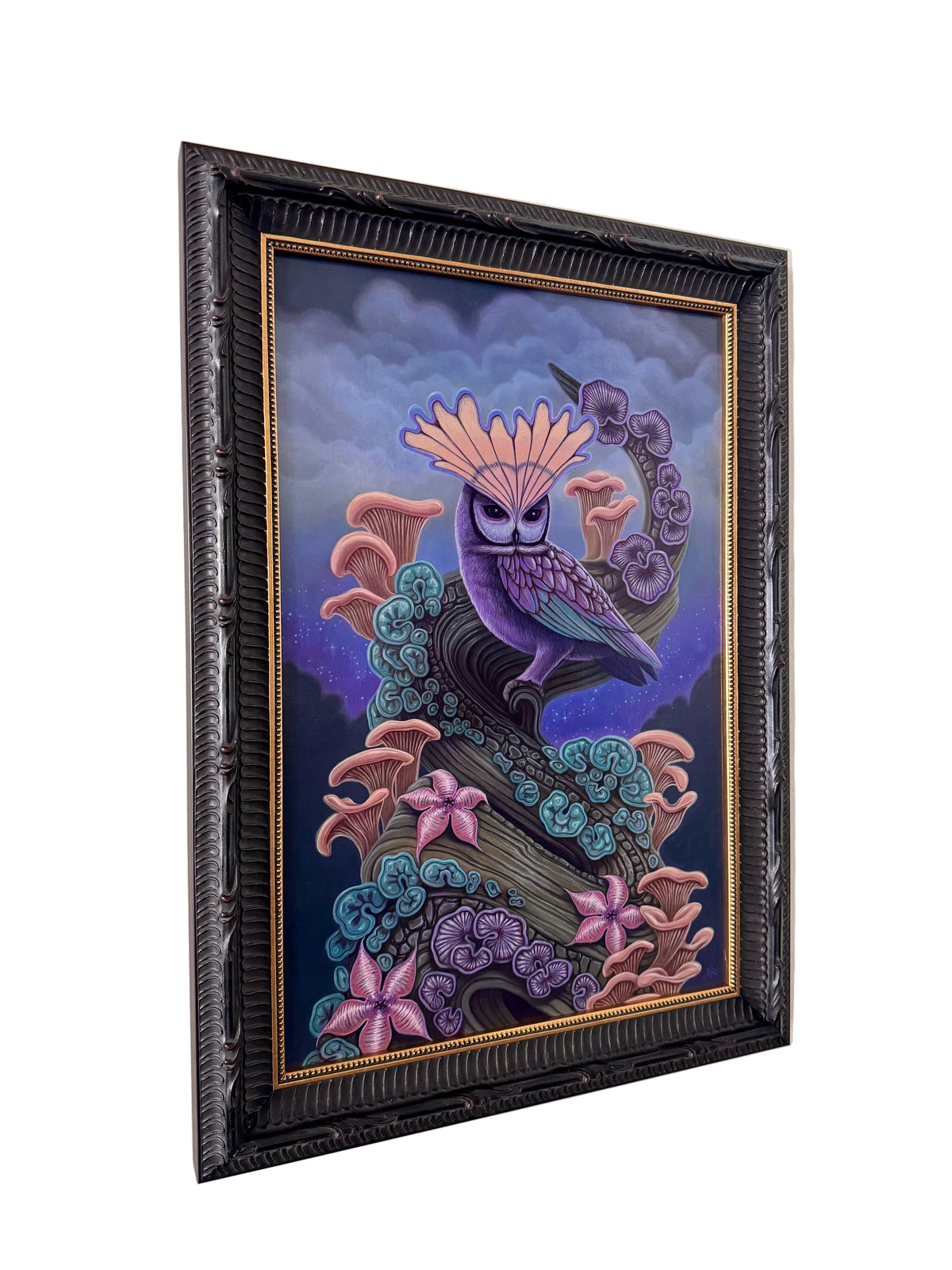 Framed artwork of a stylized bird with floral elements on a beige wall.