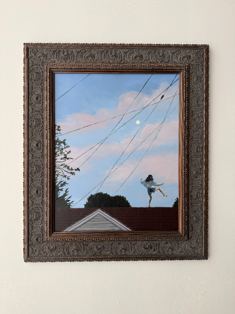 Person on a roof with power lines and a moonlit sky