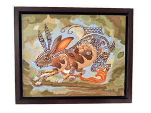 Framed artwork of a stylized rabbit with fish tail on a textured background