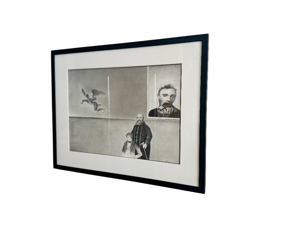 Framed black and white artwork on a wall