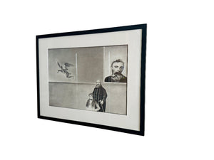 Framed black and white artwork on a wall