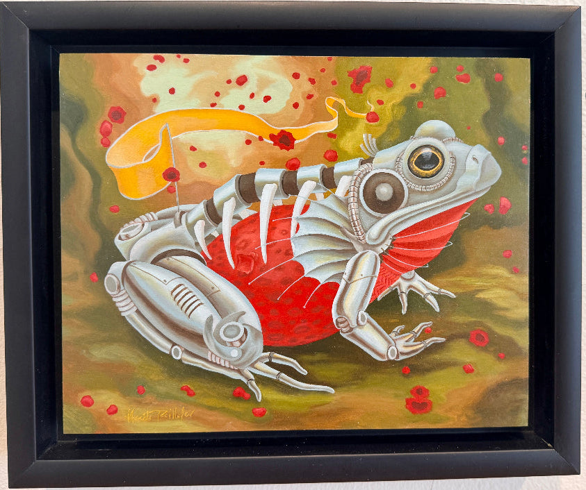 Framed artwork of a stylized frog with mechanical parts on a textured wall.