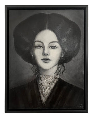 A framed black and white portrait painting of a woman with dramatic dark hair, shown hanging on a light wall.