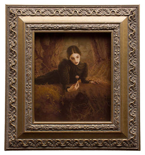 Artistic depiction of a woman in a dark outfit sitting on hay, framed in an ornate gold frame.