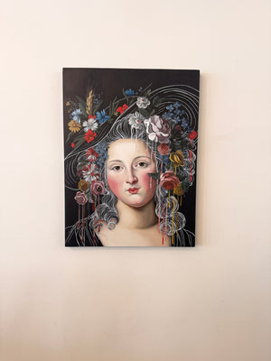 Canvas painting of a classical painting with floral elements on a beige wall.