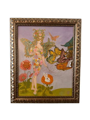 Framed artwork of a fairy-like figure with butterflies and flowers on a light background