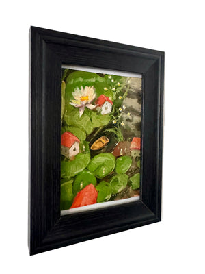 Framed artwork of a garden scene with flowers and small figures on a textured wall.