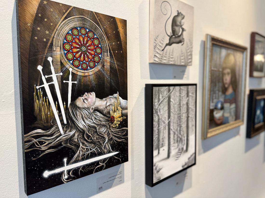 Art gallery wall with various framed artworks