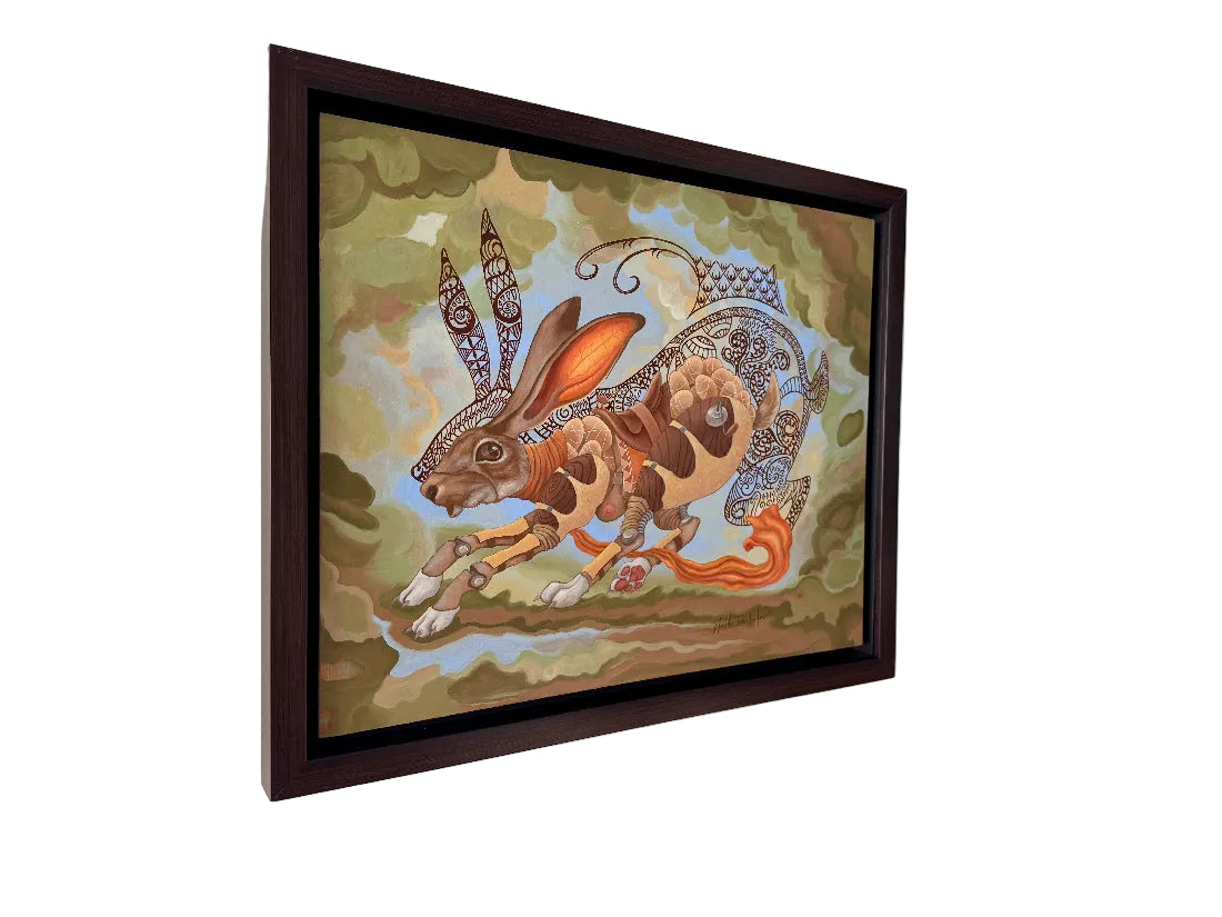 Framed artwork of a stylized rabbit on a textured wall