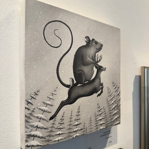 Drawing of a stylized mouse and deer in a snowy forest on a wall.