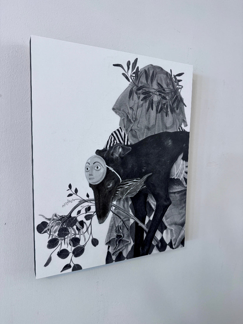 A black and white artwork mounted on a light gray wall, featuring an illustrated figure in a draped gray cloak with leafy branches and a dark goat-like animal.