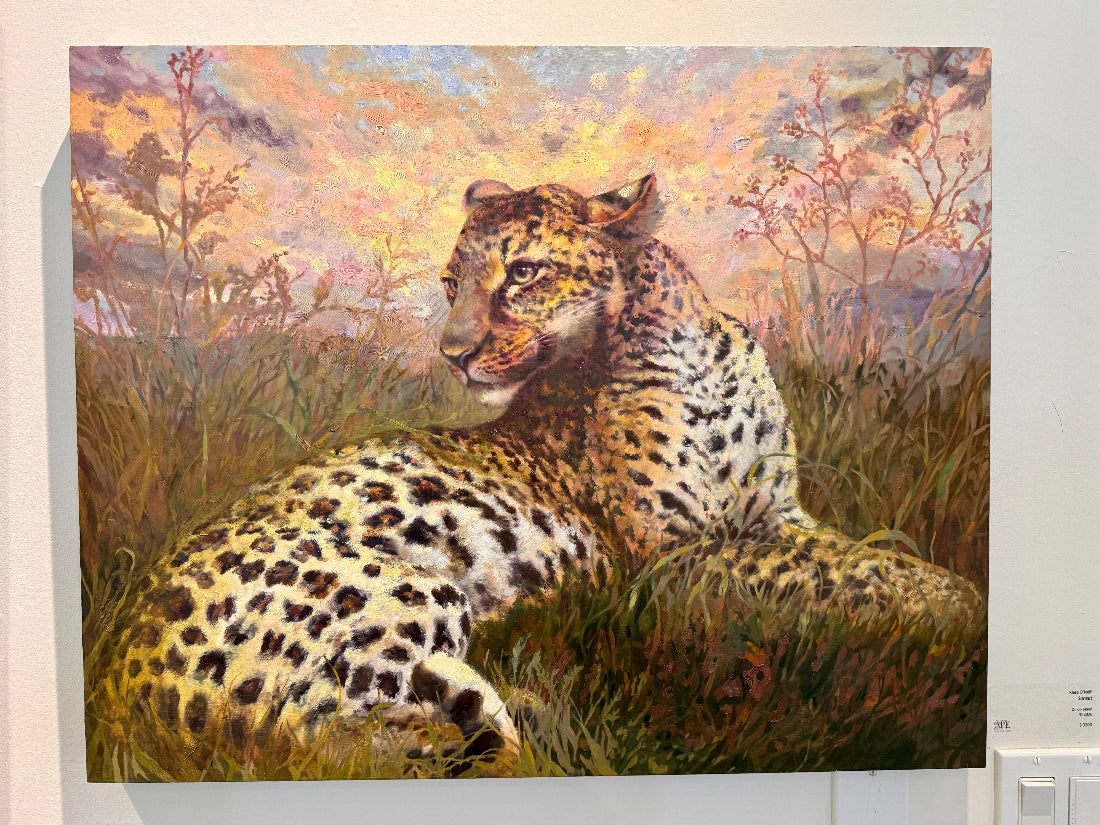 Painting of a leopard in a natural setting with a colorful sky.