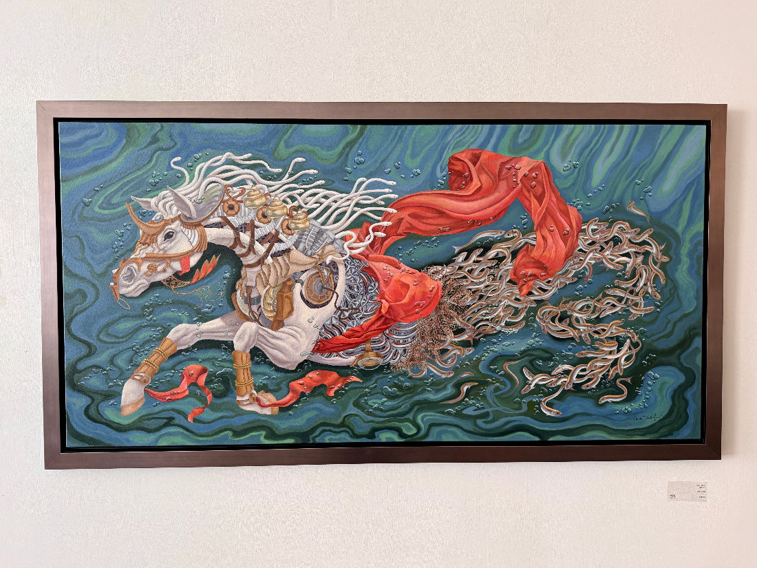 Framed artwork of a stylized horse with red fabric on a blue background