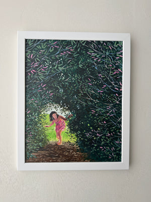 Framed artwork of a woman walking under a tree with leaves and flowers.