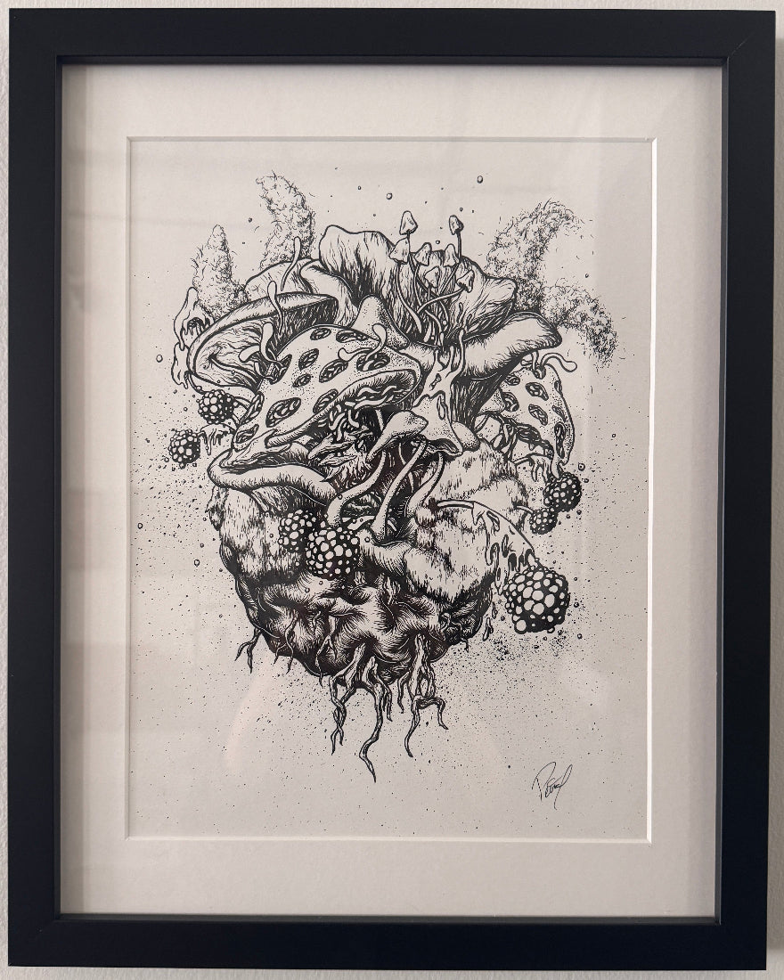 Black and white illustration of a heart with floral and plant elements on a white background