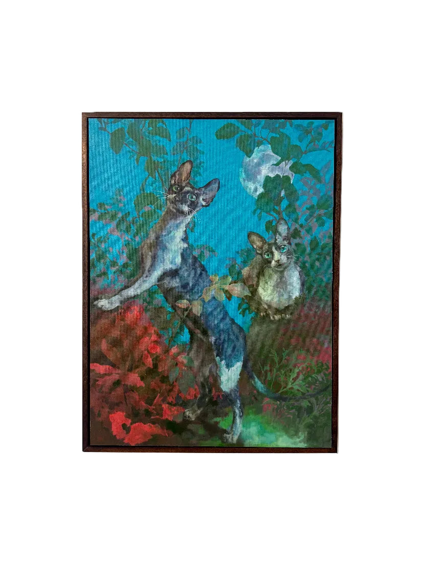 Framed painting of a two cats on a colorful background