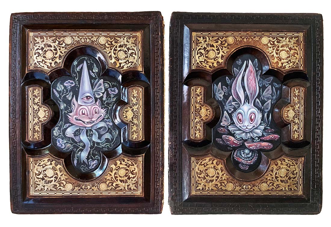 Two ornate wooden panels with intricate carvings of fantasy creatures.