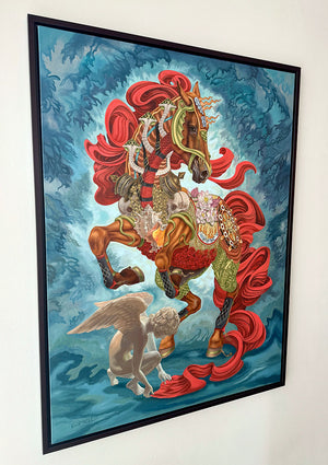 Framed artwork of a colorful horse with red fabric and an angel on a blue background.