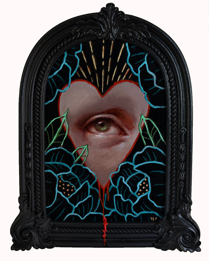 Artistic depiction of a heart with an eye and floral elements in a decorative frame.