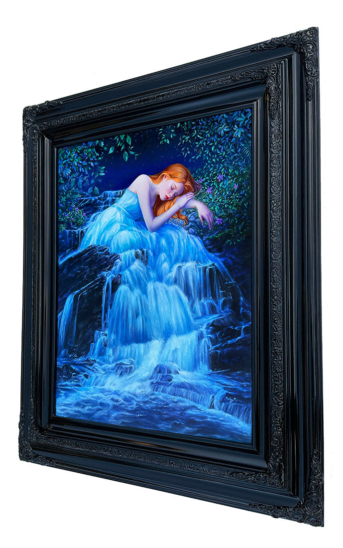 Framed artwork of a woman with red hair sitting by a waterfall on a white background