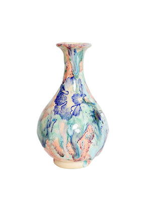 Decorative vase with butterfly design on a white background