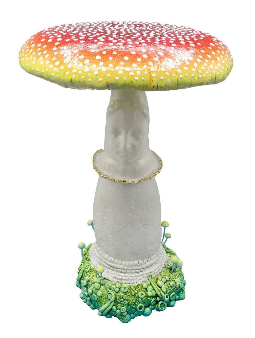 Mushroom-shaped sculpture with colorful cap and detailed stem on a gray background