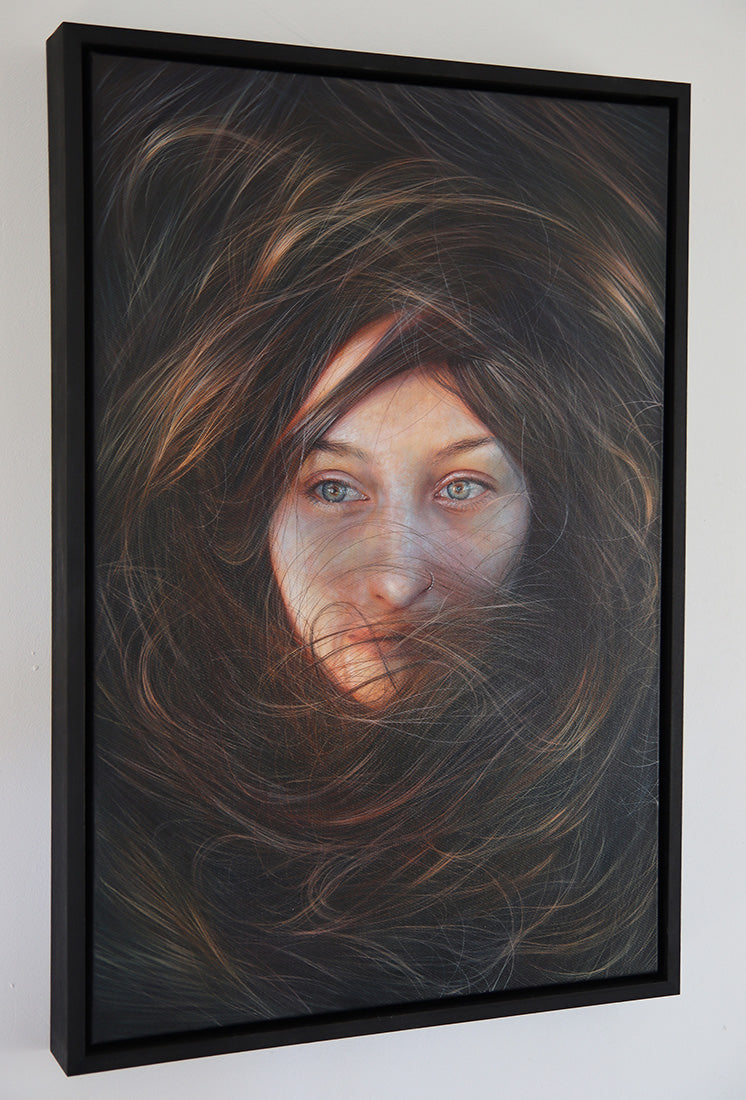 Artistic depiction of a face partially obscured by swirling hair