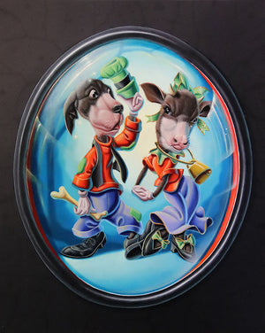 An oval decorative wall art piece featuring a painted scene of two anthropomorphic animals dressed in festive clothing, set against a bright blue background with a dark outer border.