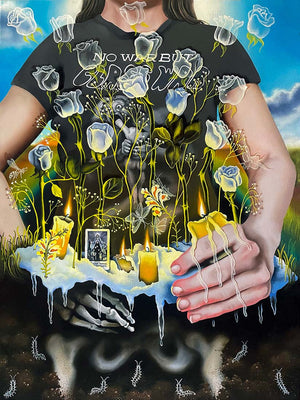 Person wearing a black t-shirt with artistic design of hands holding candles and flowers, set against a colorful background.