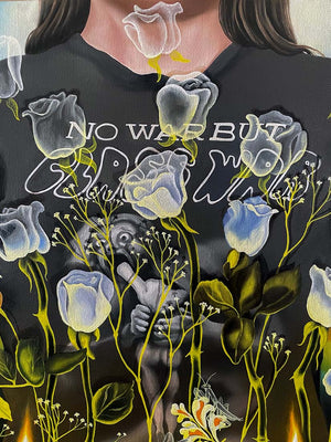 Black t-shirt with floral design and text 'No War But Class War on a dark background