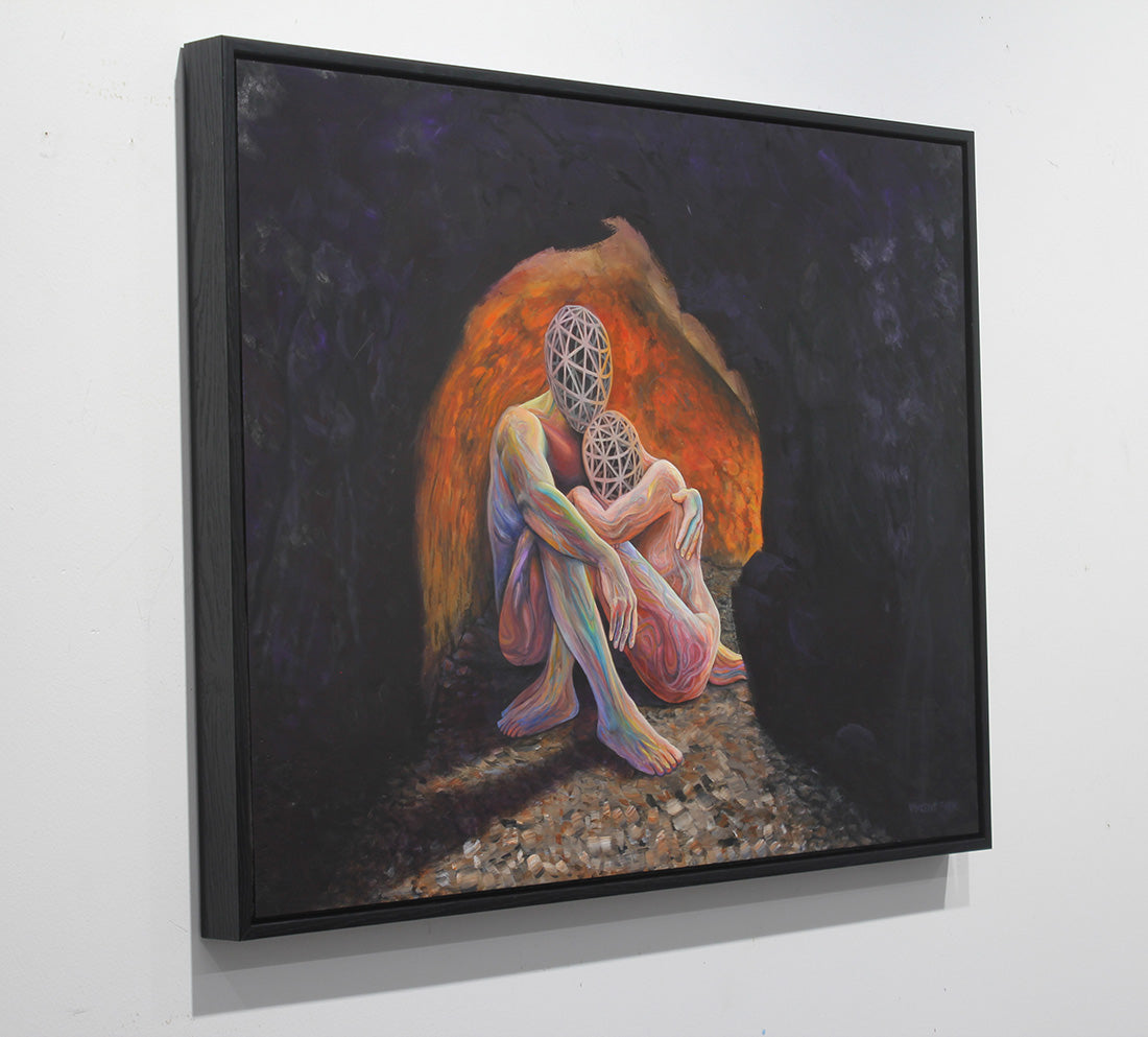 A framed surreal painting hanging on a white wall, depicting two seated figures with geometric wireframe heads against a dark background with a glowing orange halo.