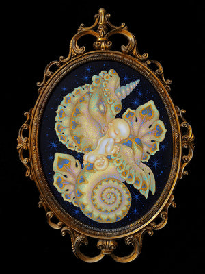 Decorative artwork with a gold frame featuring a seahorse and baby on a dark background