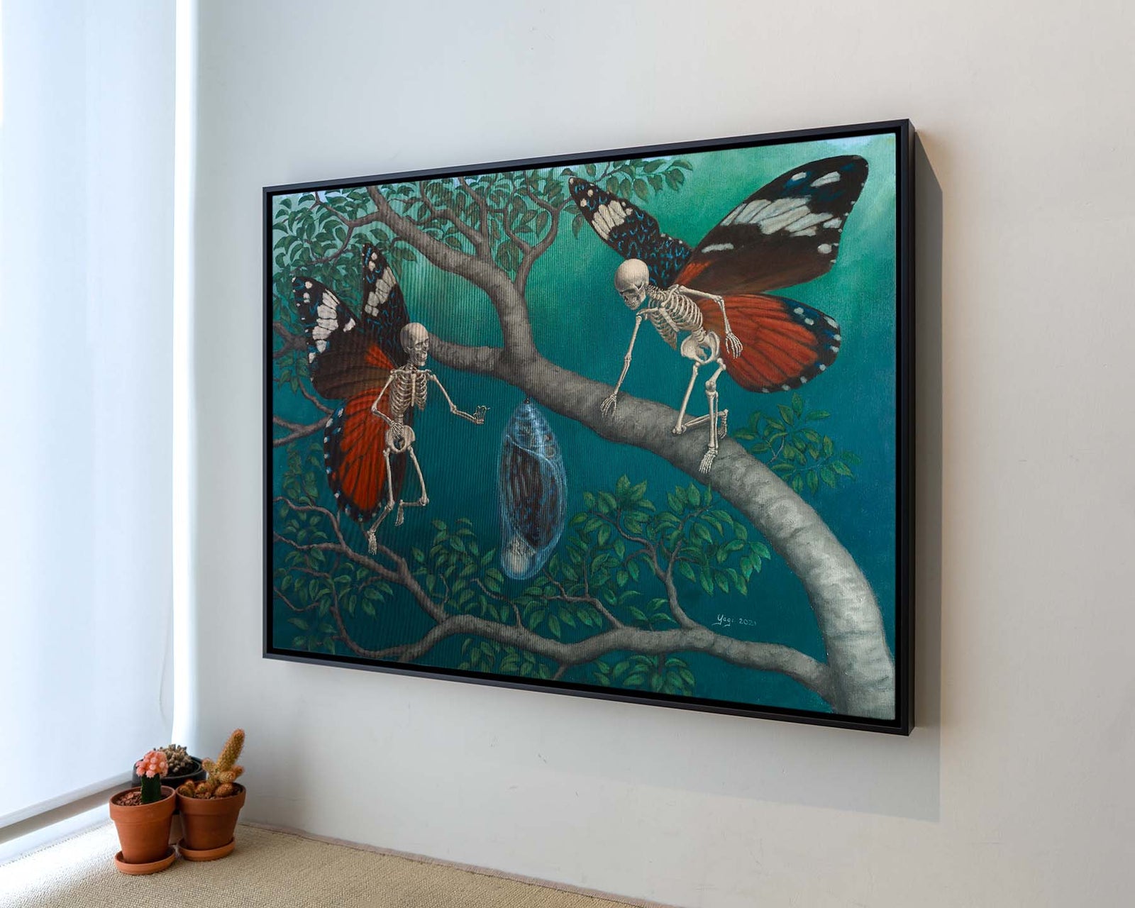 Sandra Yagi painting of two winged skeletons and cocoon